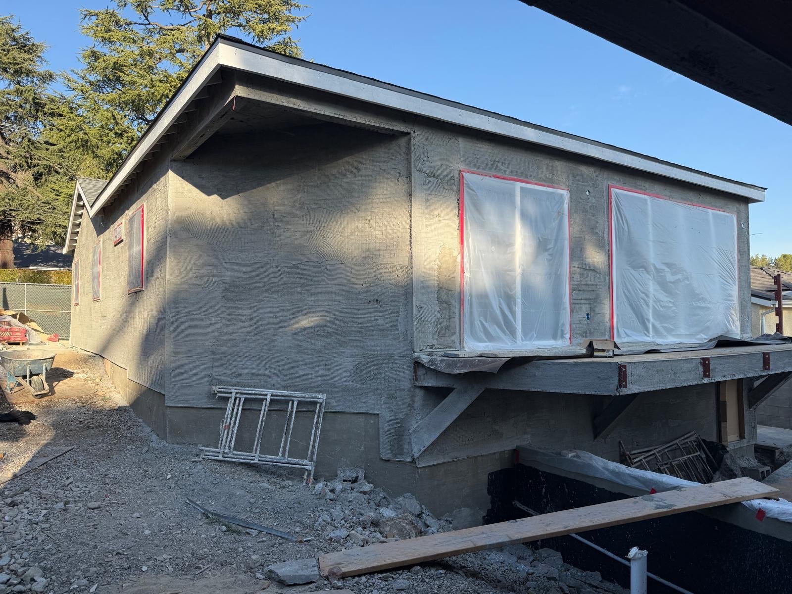 Addition with stucco scratch coat