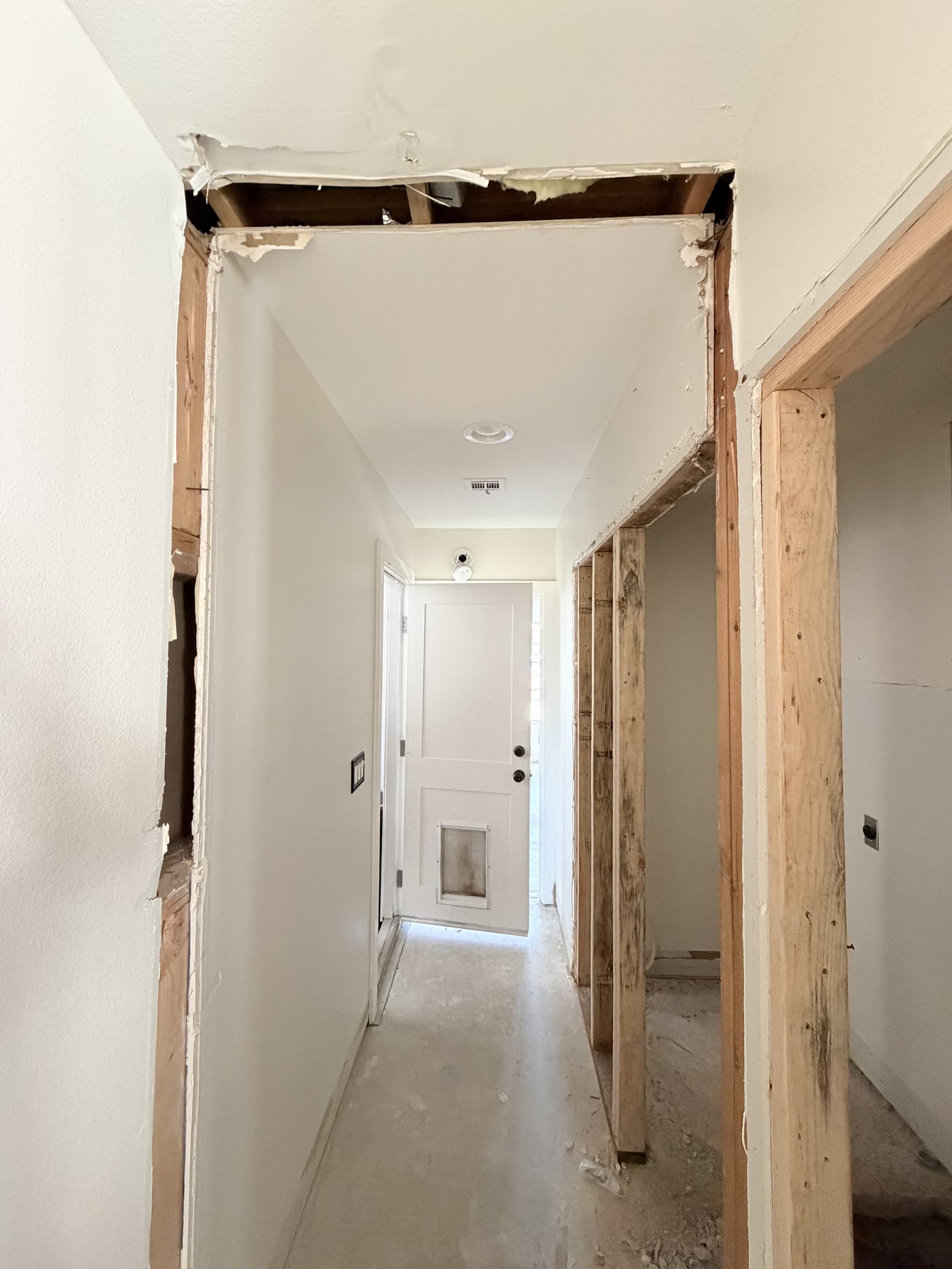 Hallway with ceiling cut open