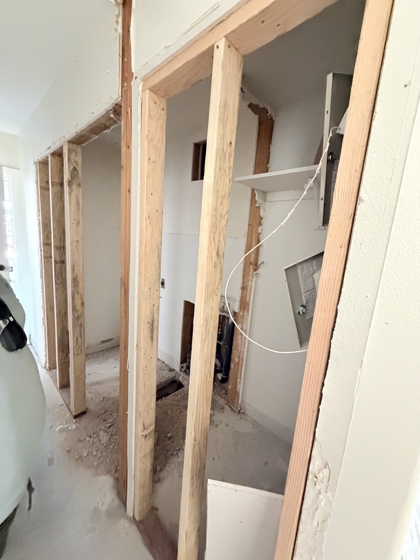 Hallway demo with exposed framing