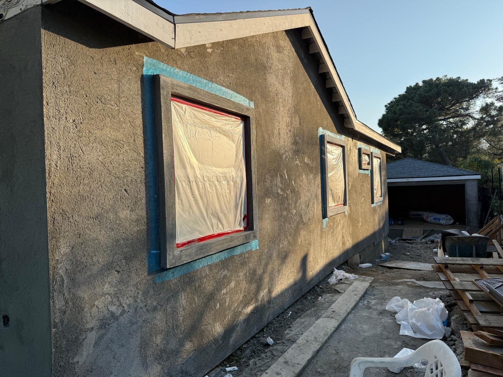 Three-coat stucco at windows